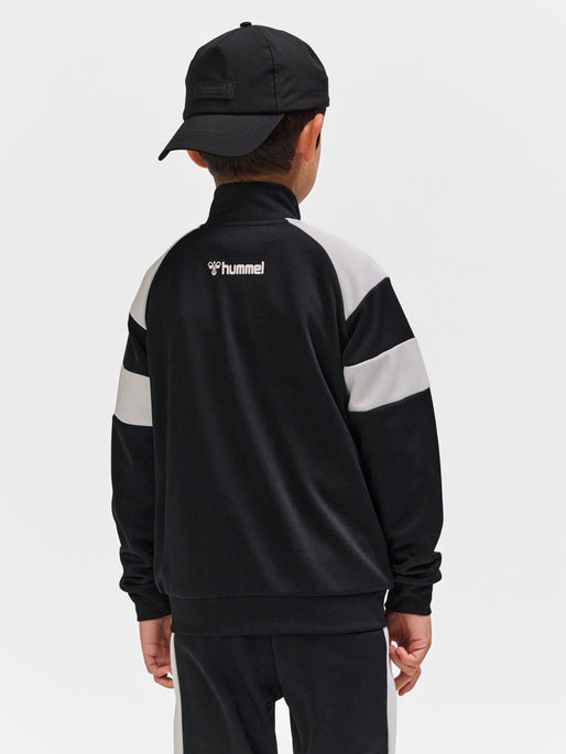Dreng med Hummel Runner Zip jakke black