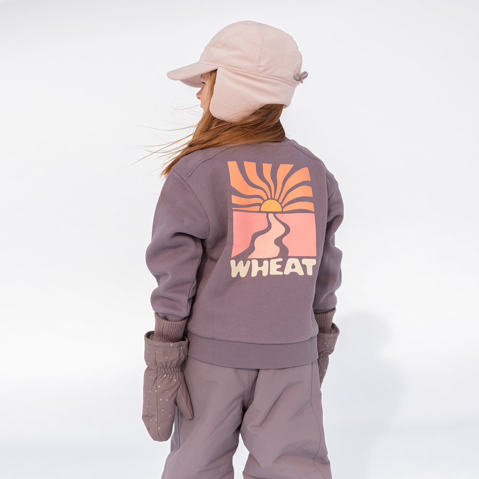 Pige med Wheat Stormy winter luffer purple stone stars