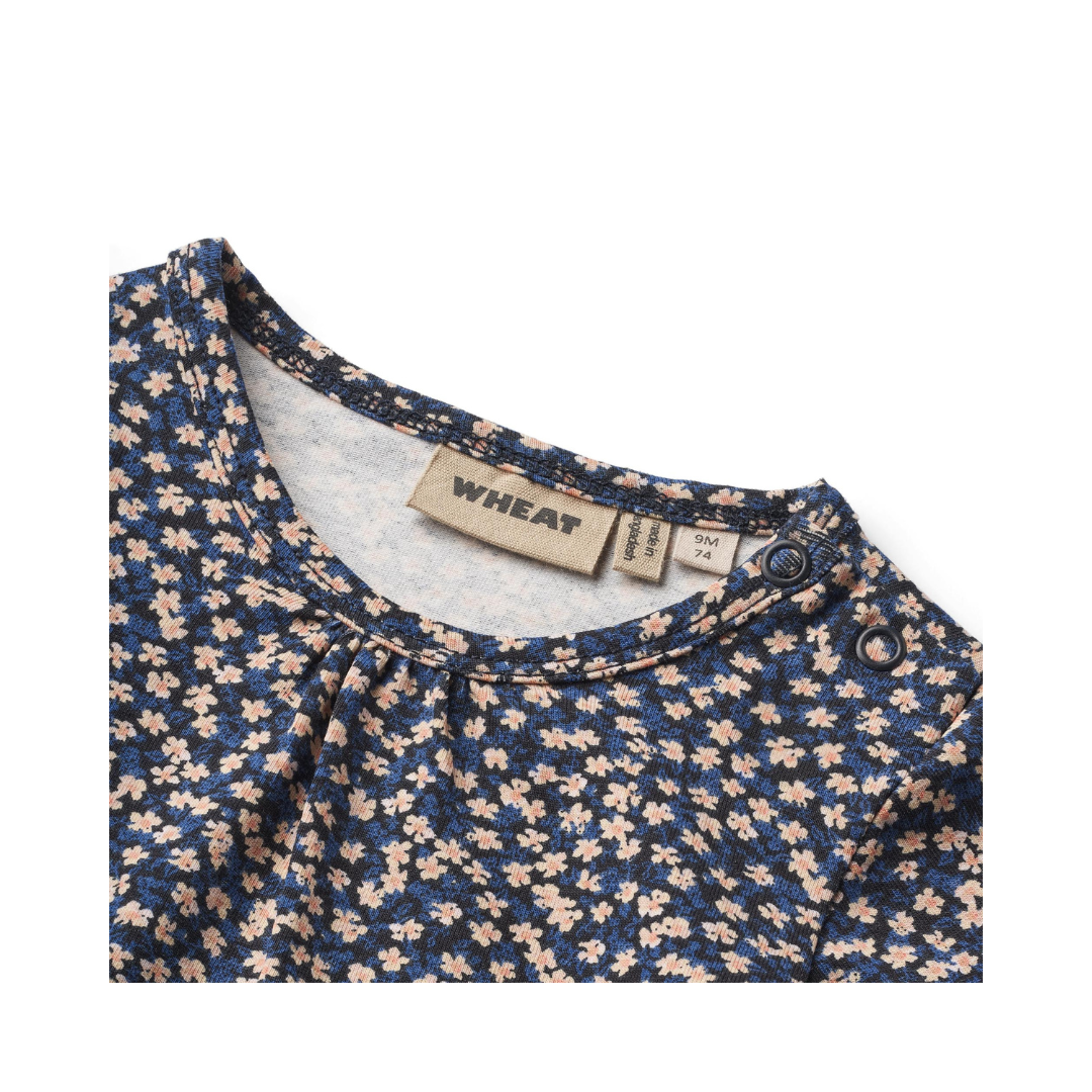 Wheat Elmine body blue flowers