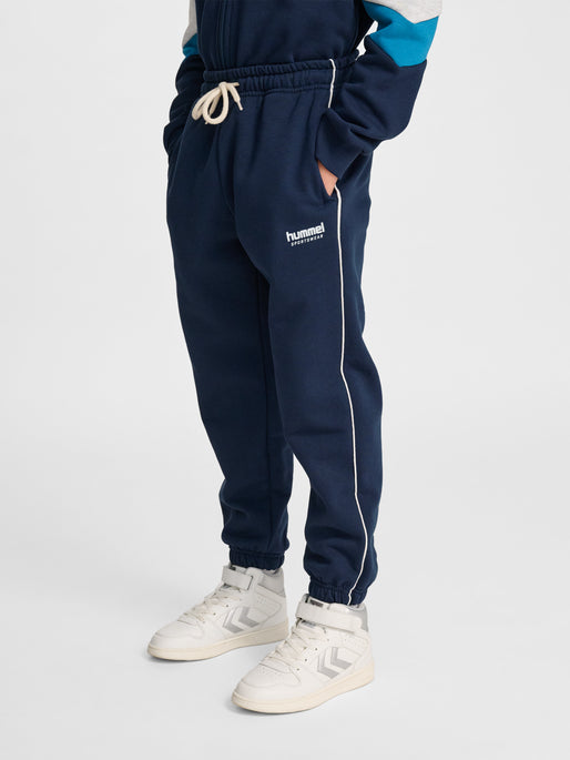 Dreng med Hummel JR Loose sweatpant pipping dress blues