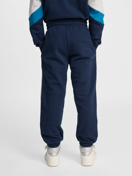 Dreng med Hummel JR Loose sweatpant pipping dress blues