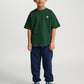 Dreng med Hummel JR Loose t-shirt S/S dark green