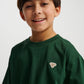 Dreng med Hummel JR Loose t-shirt S/S dark green