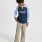 Dreng med Hummel JR loose stripe soccer jersey L/S bluse dress blues