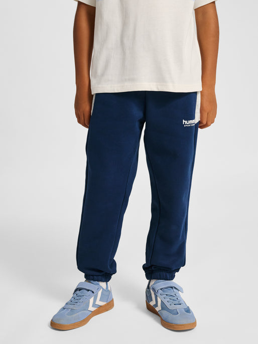 Dreng med Hummel JR loose blocked sweatpant dress blues