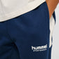 Dreng med Hummel JR loose blocked sweatpant dress blues